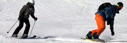descente skieur snowboardeur